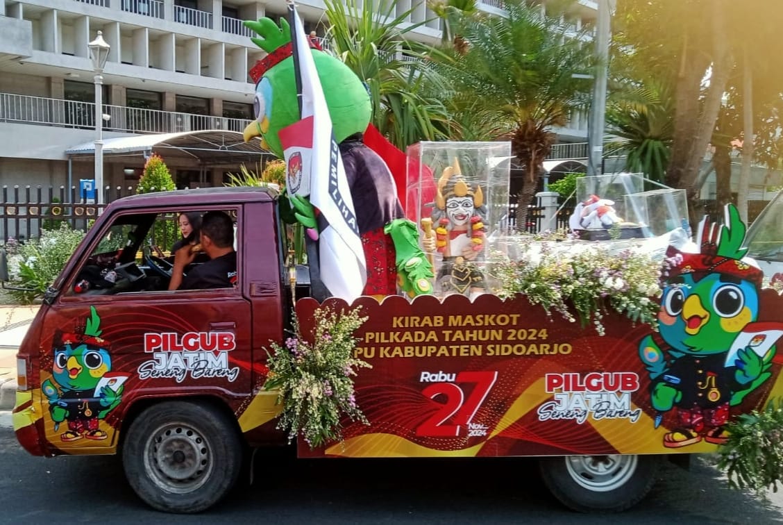 KPU Kabupaten Sidoarjo Gelar Kirab Maskot Guk KASIJO Bersama Si – JALIH ke KPU Jatim